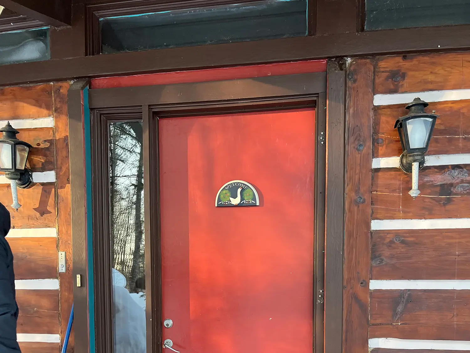 Rénovation chalet porte extérieure façade Laurentides